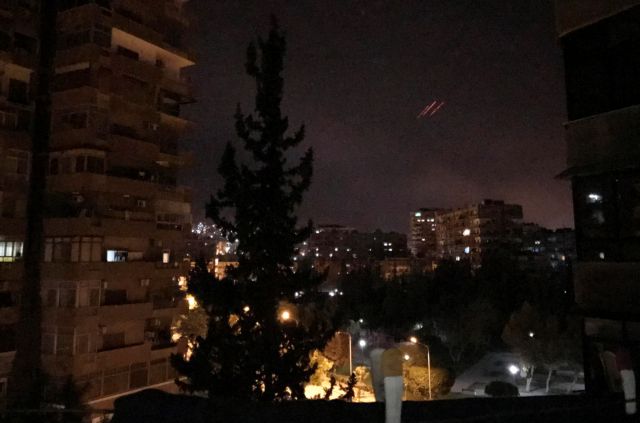 Anti-aircraft fire is seen over Damascus,Syria early April 14, 2018. REUTERS/Feras Makdesi