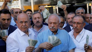 2018-08-14T110312Z_511306246_RC1239A730C0_RTRMADP_3_TURKEY-CURRENCY