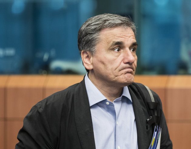 BRUSSELS, BELGIUM - JULY 12 - Greek Finance Minister Euclid Tsakalotos arrives for an Eurogroup Ministers meeting on july 12, 2018, in the Justus Lipsius, the EU Council headquarter. The Eurogroup is the monthly and informal meeting of the finance ministers of the euro area Member States, with a view to coordinating their economic policy. (Photo by Thierry Monasse/Getty Images)