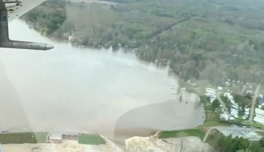 Aerial view of water from a broken Edenville Dam seen flooding the area as it flows towards Wixom Lake in Michigan, U.S. in this still frame obtained from social media video dated May 19, 2020. RYAN KALETO/via REUTERS THIS IMAGE HAS BEEN SUPPLIED BY A THIRD PARTY. MANDATORY CREDIT. NO RESALES. NO ARCHIVES. MUST ON SCREEN COURTESY RYAN KALETO