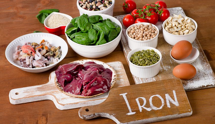 Foods high in Iron, including eggs, nuts, spinach, beans, seafood, liver, sesame, chickpeas, tomatoes.