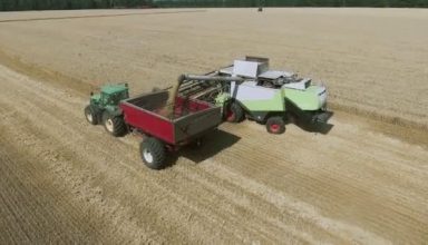 depositphotos_365822636-stock-video-aerial-view-of-combine-harvester