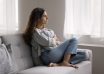 Serious,Pensive,Young,Woman,Thinking,On,Problem,,Hugs,Cushion,Seated
